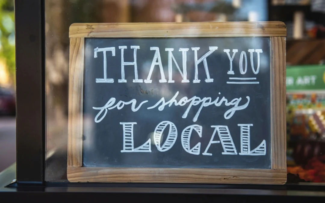 Chalkboard slate that says thank you for shopping local